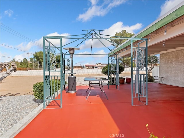 view of patio with fence