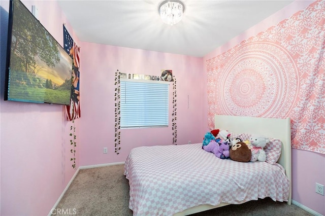 carpeted bedroom with baseboards