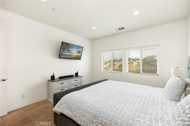 carpeted bedroom featuring visible vents and recessed lighting