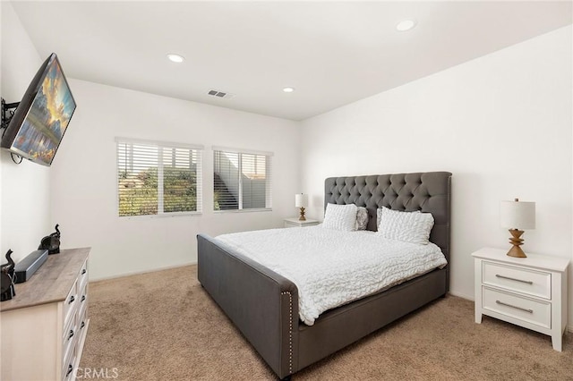 bedroom with recessed lighting, visible vents, and carpet flooring