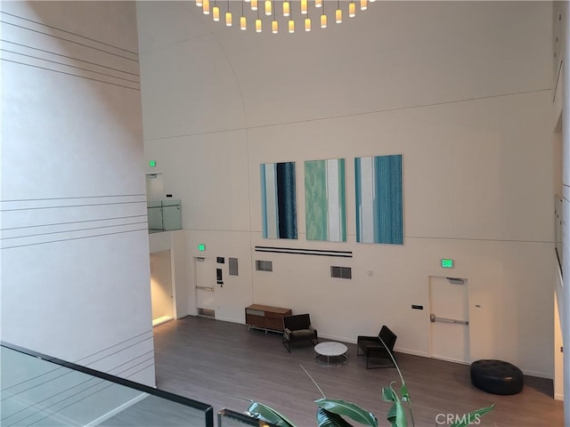 interior space with visible vents and stucco siding