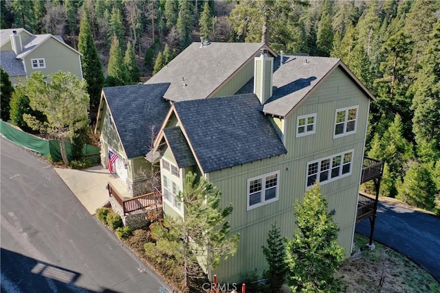 bird's eye view featuring a view of trees