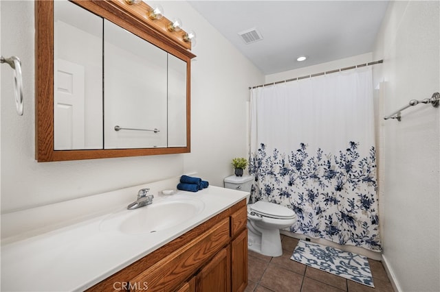 full bathroom with tile patterned flooring, toilet, vanity, visible vents, and a shower with curtain