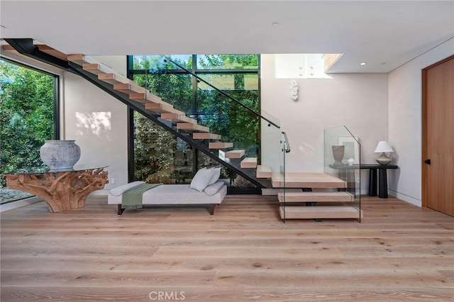 interior space with wood finished floors and a wealth of natural light