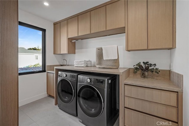 laundry room with cabinet space, recessed lighting, baseboards, and independent washer and dryer