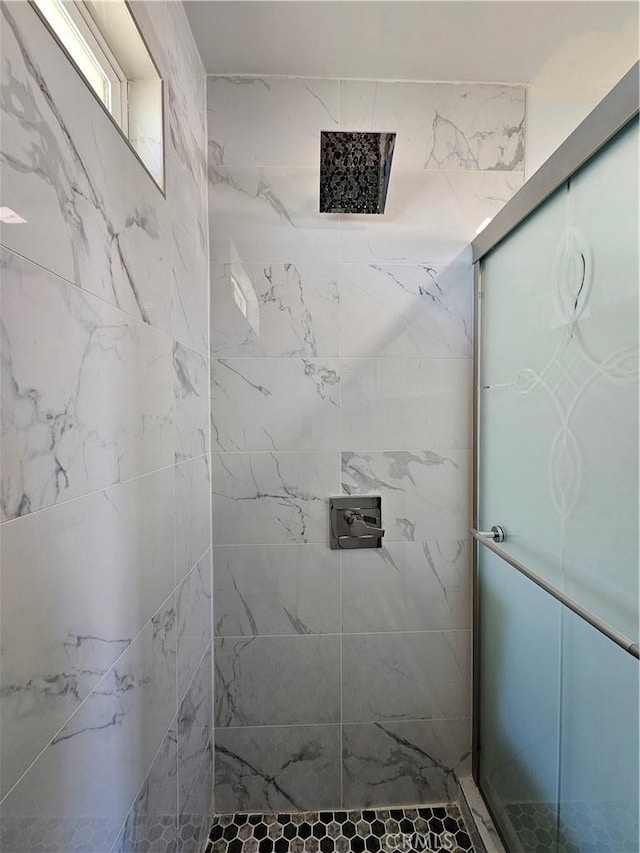 full bathroom with a stall shower