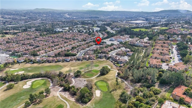 birds eye view of property featuring a mountain view and golf course view