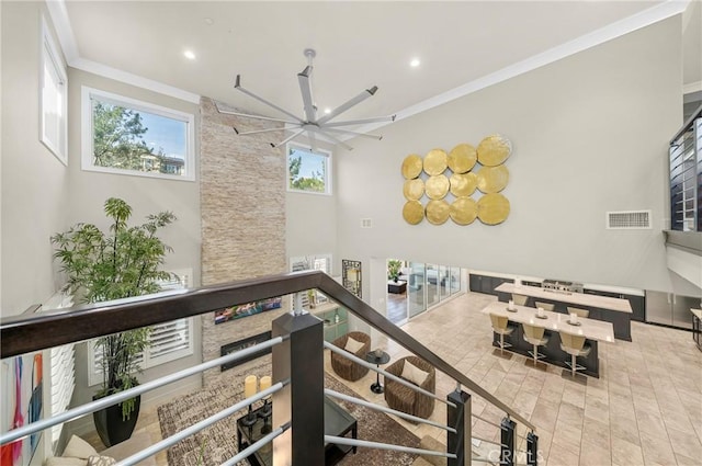 interior space featuring a patio area, stairs, visible vents, and outdoor dining area