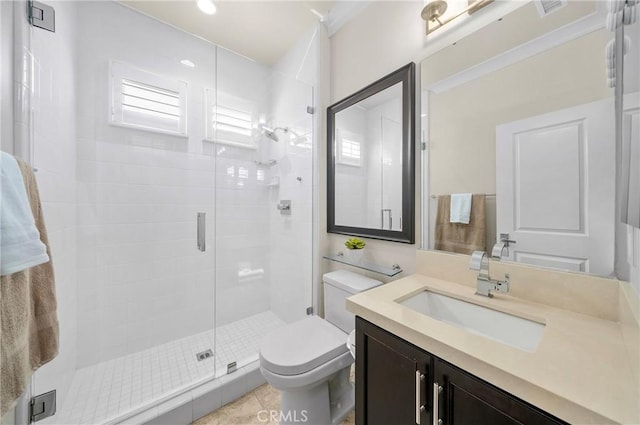 full bath featuring toilet, a shower stall, and vanity