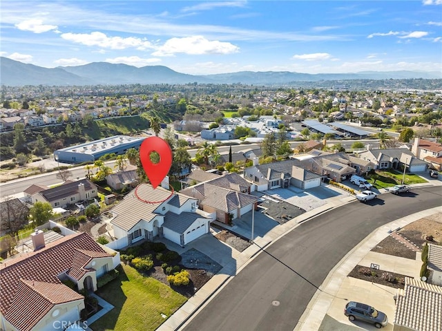 aerial view with a residential view and a mountain view