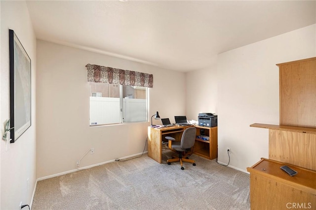 office area with carpet and baseboards