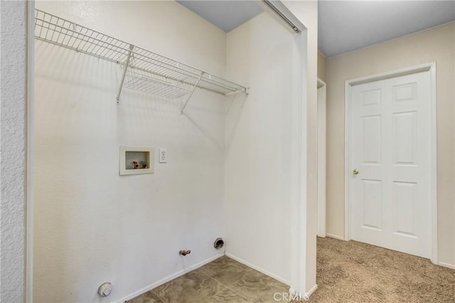 clothes washing area featuring hookup for a washing machine, hookup for a gas dryer, carpet flooring, laundry area, and baseboards