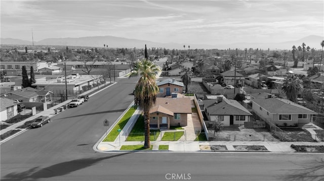 aerial view with a mountain view and a residential view