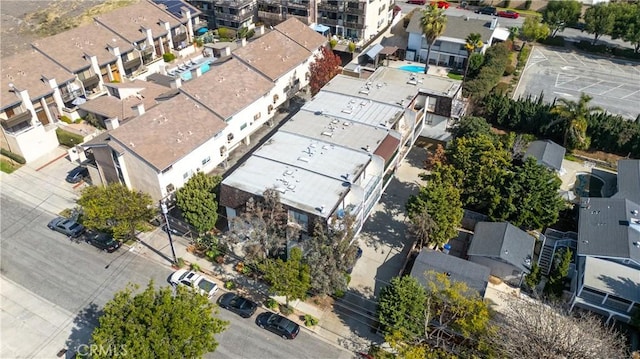 birds eye view of property with a residential view