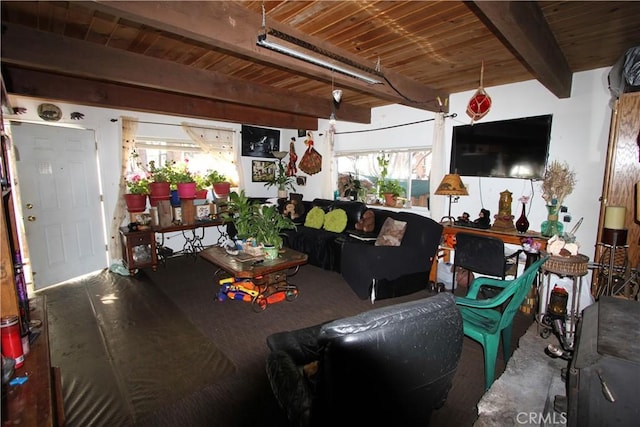 interior space featuring wood ceiling, beam ceiling, and wood finished floors