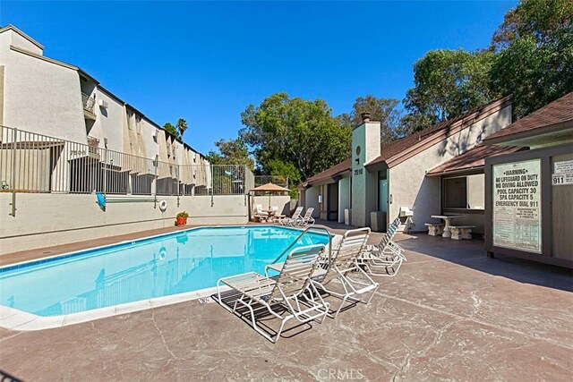 7506 Parkway Dr Unit 104, La Mesa, CA 91942 - community pool featuring a patio and a residential view
