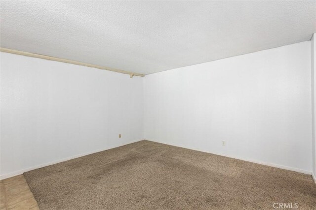 7506 Parkway Dr Unit 104, La Mesa, CA 91942 - spare room with carpet floors