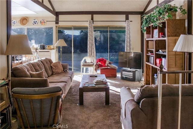 carpeted living room with vaulted ceiling