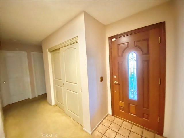 foyer with light tile patterned floors