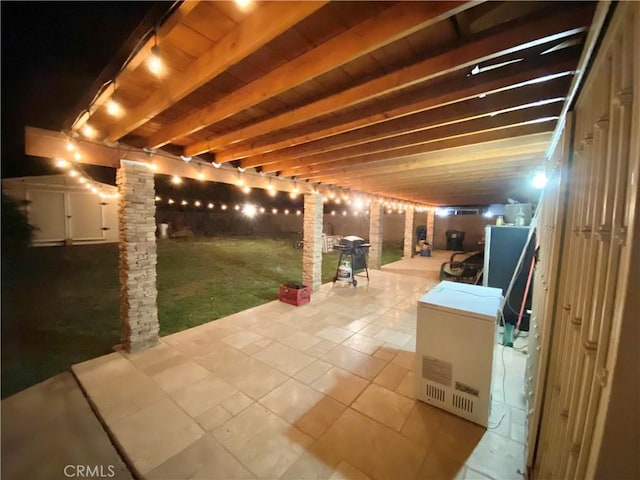 view of patio / terrace with a storage unit