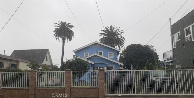 view of gate with fence