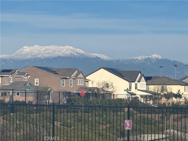 property view of mountains featuring a residential view