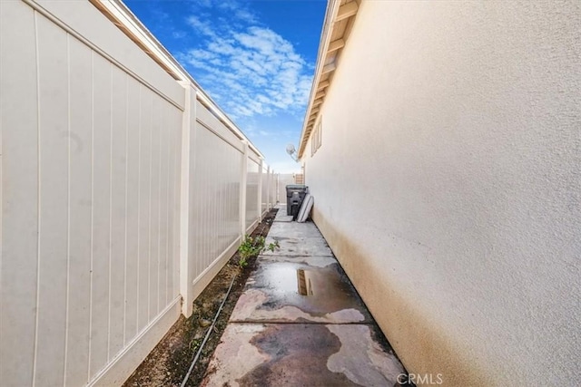 view of property exterior with fence