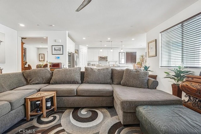 living area featuring recessed lighting