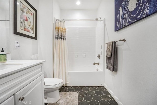 full bathroom with toilet, vanity, baseboards, tile patterned floors, and shower / bath combo