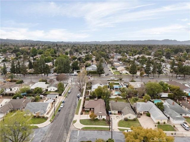 drone / aerial view with a mountain view and a residential view