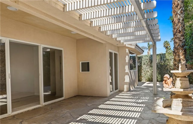 view of patio featuring a pergola