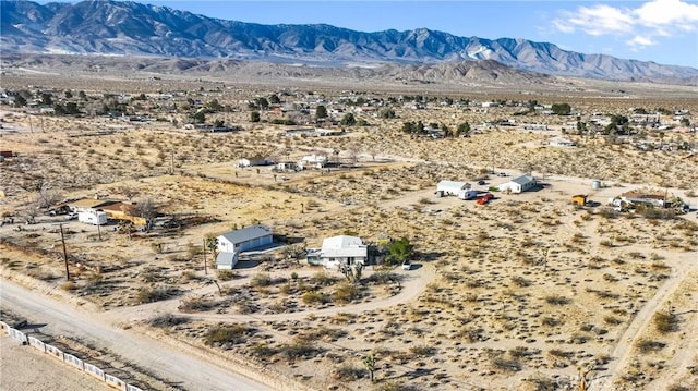 aerial view with view of desert and a mountain view