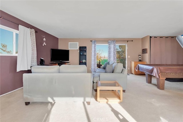 living area featuring light colored carpet