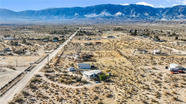 bird's eye view featuring a mountain view and a desert view