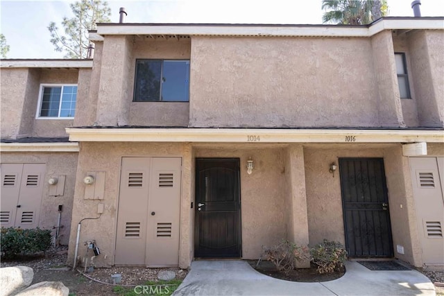 multi unit property featuring stucco siding