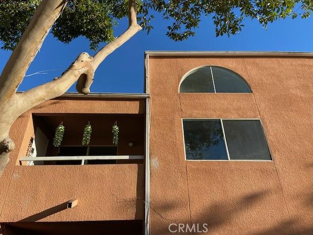 exterior space featuring stucco siding