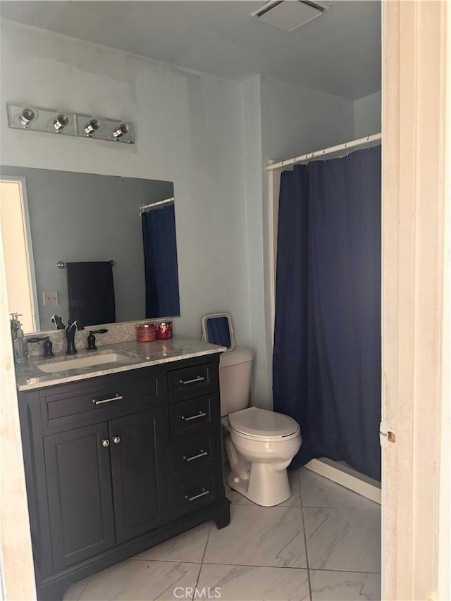 bathroom with visible vents, toilet, a shower with curtain, marble finish floor, and vanity