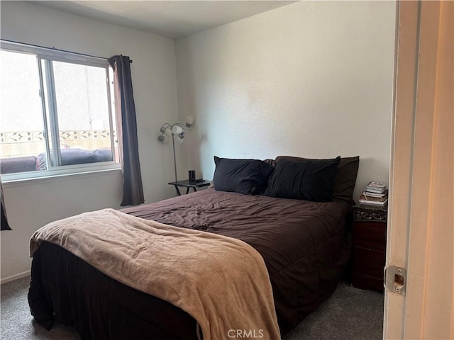 bedroom featuring carpet