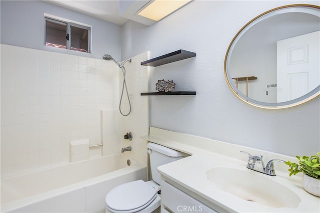 full bath with toilet,  shower combination, and vanity