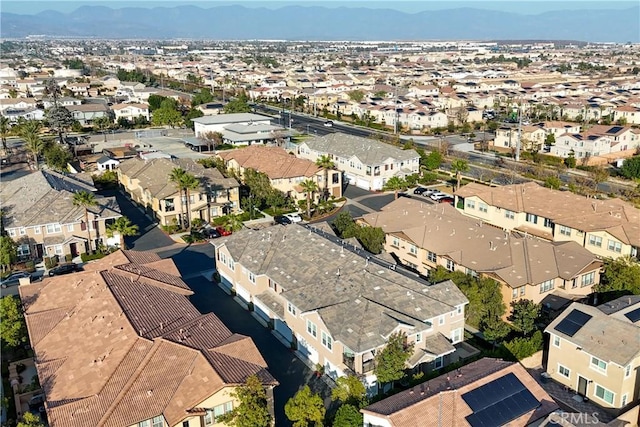 drone / aerial view with a residential view and a mountain view