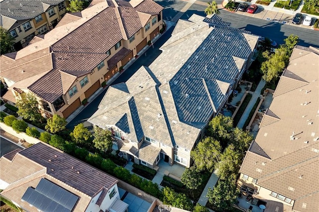 birds eye view of property with a residential view