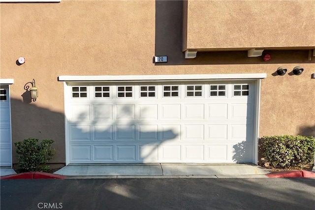 garage with driveway