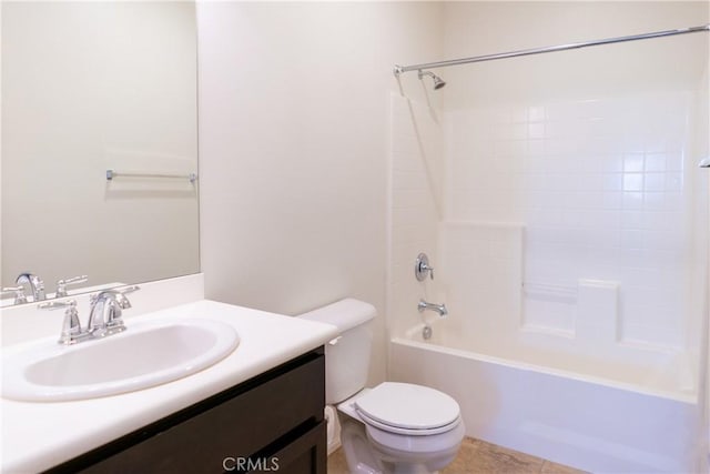 full bath with shower / bathtub combination, vanity, and toilet