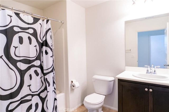 bathroom featuring toilet, visible vents, vanity, baseboards, and shower / bath combination with curtain