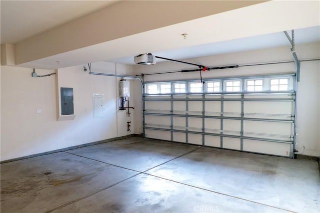 garage featuring a garage door opener and electric panel