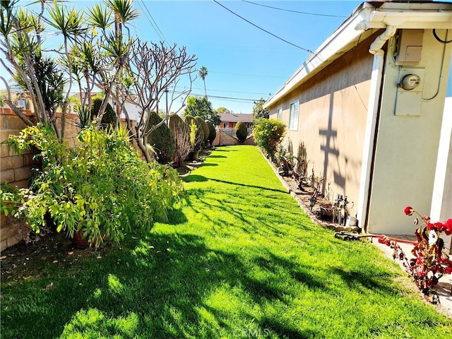 view of yard featuring a fenced backyard