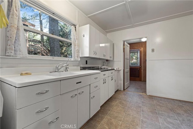 1779 Virginia St, Wrightwood, CA 92397 - kitchen featuring light countertops, a sink, and white cabinetry