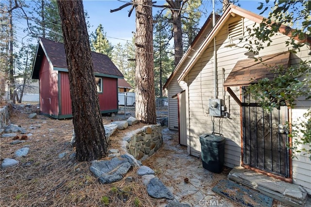 1779 Virginia St, Wrightwood, CA 92397 - view of yard with a shed, an outdoor structure, and fence