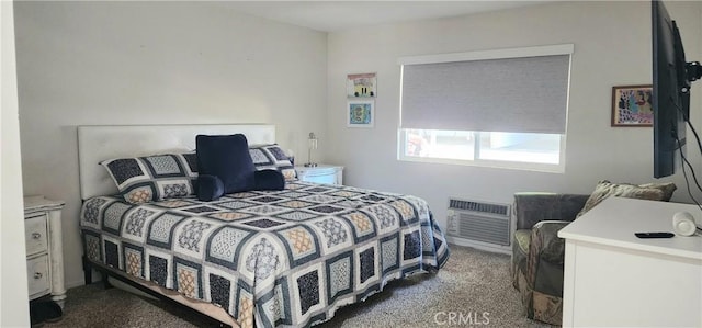 carpeted bedroom with a wall mounted AC