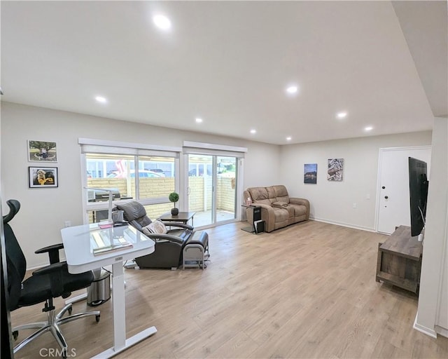 3311 Via Carrizo Unit P, Laguna Woods, CA 92637 - living room featuring a desk, recessed lighting, light wood-style floors, and baseboards